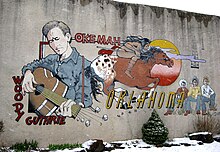 Guthrie has continued to remain popular decades after his death; this mural was painted in his hometown of Okemah in 1994