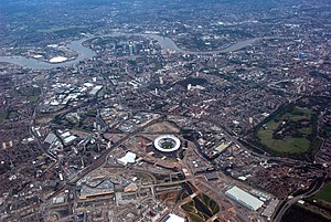 Aerial overview of the Olympic Park south towards the River Thames, during construction in April 2011. With the Olympic Stadium in the centre of picture, the Olympic Village is at the bottom, centre