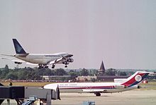 A Dan-Air Boeing 727-200 Advanced and Garuda Indonesia Boeing 747-200B at Gatwick in 1990 PK-GSA Boeing 747-2U3B (cn 22246 452) Garuda Indonesia, London - Gatwick - UK, August 1990. (5500082968).jpg