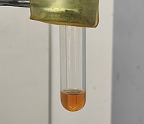 PdCl2(MeCN)2 dissolving in acetone.jpg