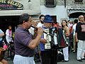 Ettore Losini plays the piffero, accompanied by an accordionist, in the piazza at Bobbio