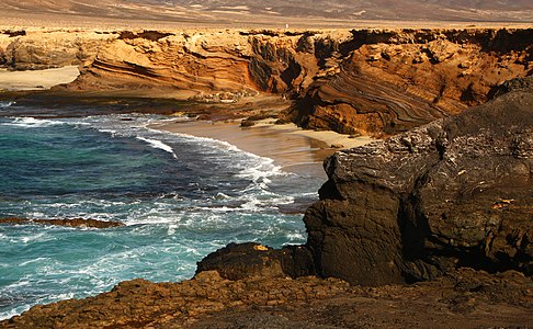 Coast at the Playa de Ojos north of Puertito de la Cruz, Fuerteventura, Canary Islands.