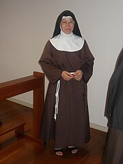 The religious habit of the Clarisses (also known as Poor Clares) is brown, with a black veil