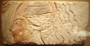 Relief Depicting the Purification of Queen Kiya (?) (1985.328.8); Limestone, paint; ca. 1353–1336 B.C.; H. 22.8 × l. 47 × d. 2.5 cm (9 × 18 1/2 × 1 in.); Metropolitan Museum