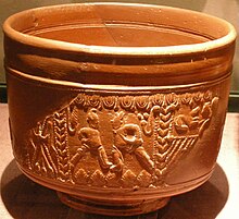 Samian ware pot showing gladiators Roman Museum 123.jpg