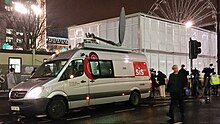 SIS Live SNG vehicle covering the 2014 Glasgow bin lorry crash SIS Live (16080563141).jpg