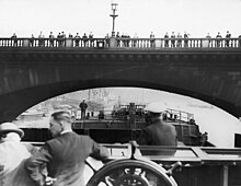 Wandsworth and District Gas Company's SS Ewell in 1926 approaching London Bridge with her mast, funnel and wheelhouse folded down SS 'Ewell' about to pass under London Bridge.jpg