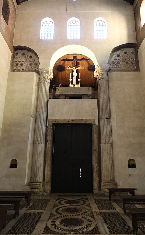 Two columns from a Roman loggia incorporated into the entrance wall.