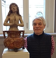 Simon Holt with a sculpture of St Vitus in the kettle in 2017 Simon Holt.jpg