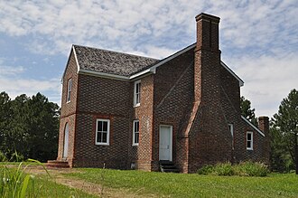 Southeast elevation of the Matthew Jones House, showing the Period II porch tower and shed room additions. Southeast elevation of the Matthew Jones House..JPG