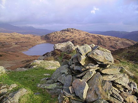 Summit cairn of Wool Knott, with view of Beacon Tarn Summit Cairn, Wool Knott - geograph.org.uk - 318430.jpg