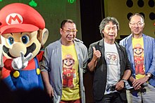 Takashi Tezuka, Shigeru Miyamoto e Kōji Kondō in occasione del trentesimo anniversario di Super Mario Bros..