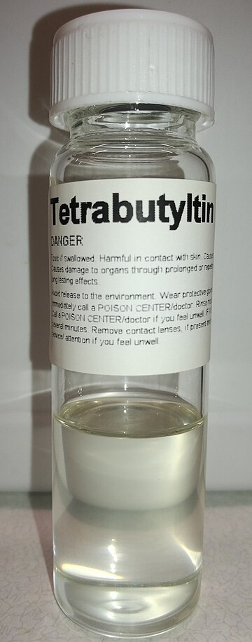 File:Tetrabutyltin compound in glass bottle.jpeg