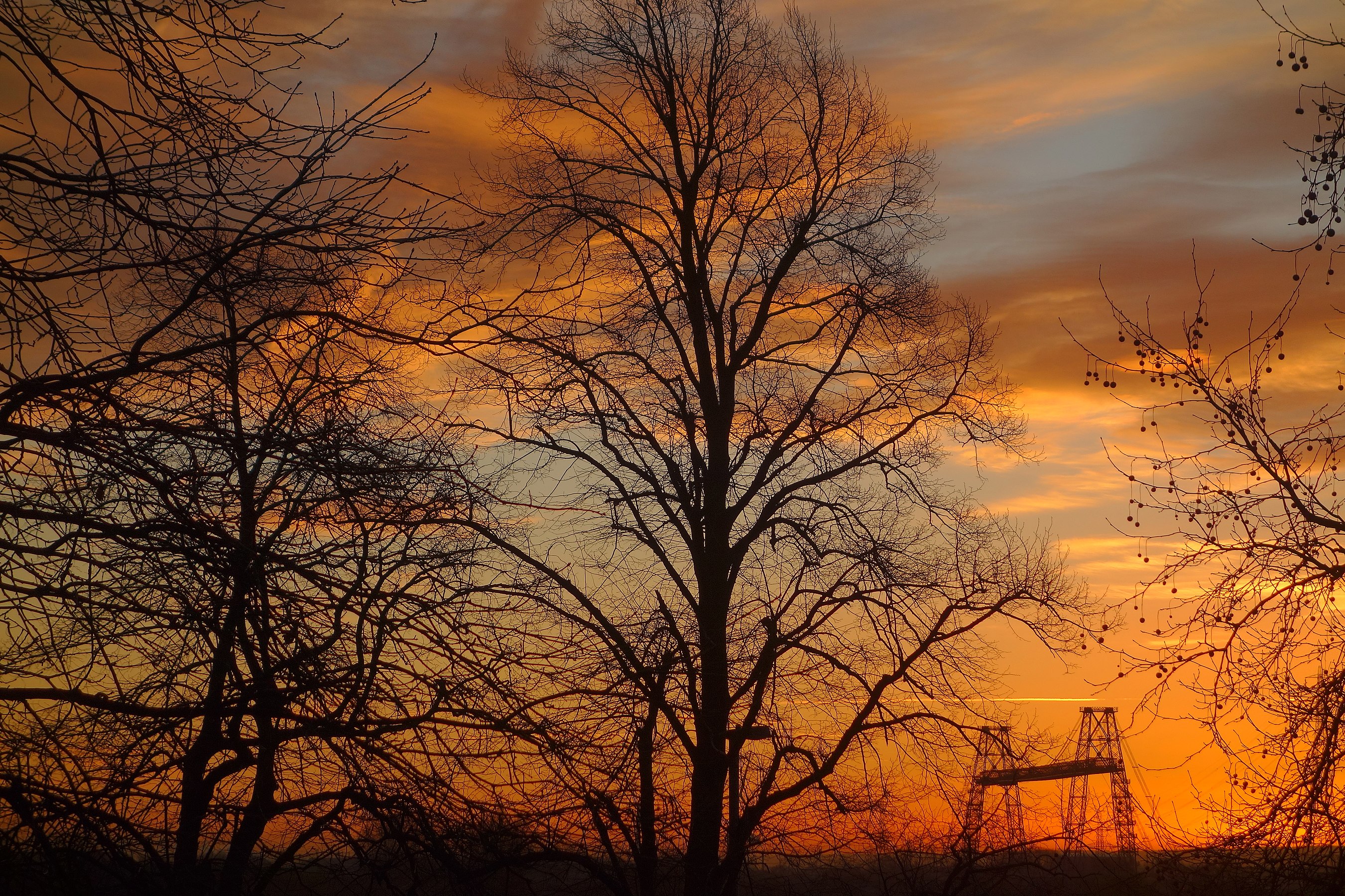 Commended: Seen from Belle Vue Park, an aeroplane leaves a trail over the Transporter Bridge in a winter sunrise. Author: WelshDave