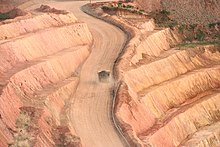 Truck hauling ore from Karta Pit, SMD Crew Gold - panoramio.jpg