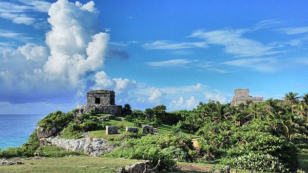 Temple of the God of Wind (left) and Castillo (right)