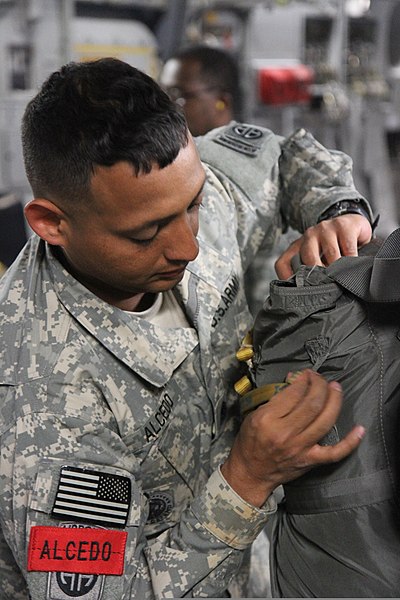 File:U.S. Army 1st Sgt. Jean P. Alcedo, the first sergeant for Headquarters and Headquarters Company, 3rd Brigade Combat Team, 82nd Airborne Division, conducts a jump master personnel inspection at an in-flight rig 130531-A-JH269-257.jpg