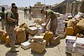U.S. Marines with 1st Battalion, 5th Marine Regiment sort mail at Patrol Base Jaker in the Nawa district, Helmand province, Afghanistan, on Aug 23, 2009 090823-M-YD124-176.jpg