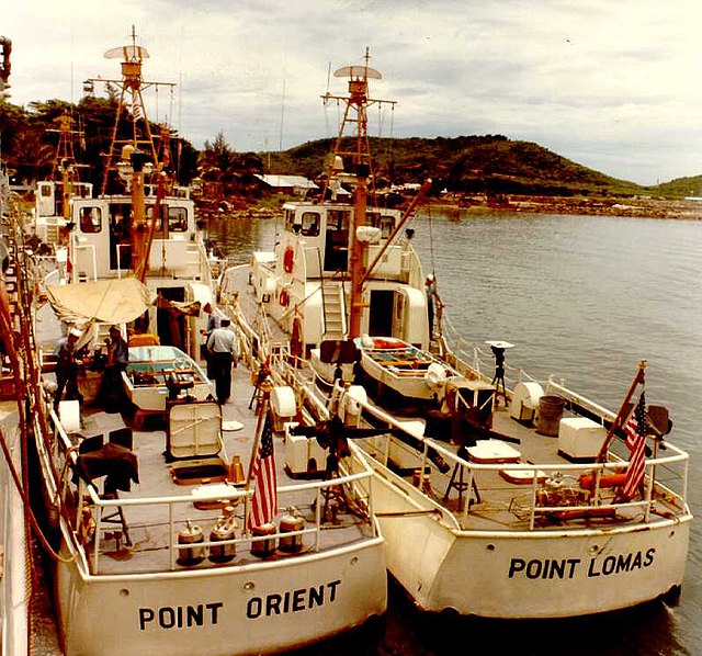 Crews of Point Lomas and Point Orient (left) prepare for an inspection at Danang Navy Base, 24 July 1965