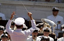 US Navy 060529-N-2383B-123 The U.S. Navy band performs during Memorial Day ceremonies held in the amphitheater of Arlington National Cemetery.jpg