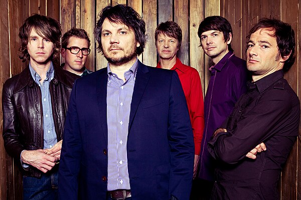 Wilco at Massachusetts Museum of Contemporary Art, Solid Sound Fest, 2011. Pictured left to right: Patrick Sansone, Mikael Jorgensen, Jeff Tweedy, Nel