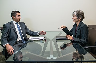 In semi-structured interviews there will be central themes to explore but the interviewer does not have to use a strict set of questions. Young Man in a Interview.jpg