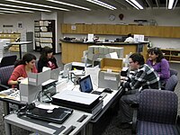 Attendees at a scan-a-thon at the National Archives in College Park