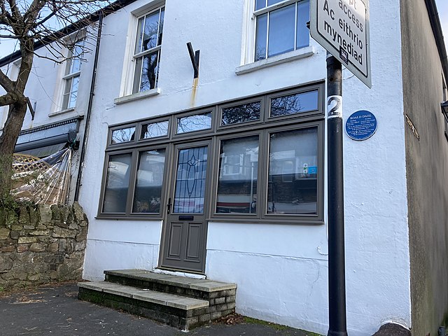 Mrs Pratchett's former sweet shop in Llandaff, Cardiff, has a blue plaque dedicated to Dahl. His autobiography Boy: Tales of Childhood recalls the pra