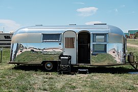 1962 Airstream Tradewind custom gold 24 foot travel trailer during 2019 Vintage Camper Trailer Rally