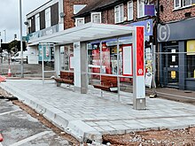 Newly installed 'Sprint' bus shelter, at the Scott Arms, Great Barr, Birmingham seen in August 2021 A34 'Sprint' bus shelter, Scott Arms, Birmingham 2021-08-06 - Andy Mabbett.jpg