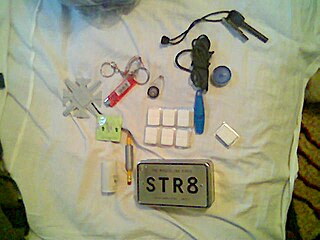 Mini survival kit Small kit containing essential survival tools
