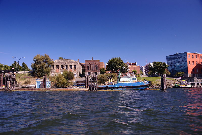 File:A tugboat, and a mural, in British Columbia.jpg