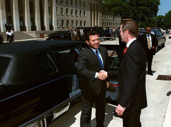 Abdullah welcomed by US Secretary of Defense William Cohen during his first visit to the United States as king in 1999