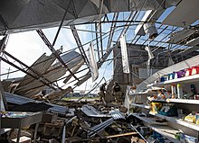 Walgreens destroyed in Hurricane Ida, Larose, 2021 Alabama National Guard protects damaged Walgreens from Hurricane Ida survivors, Larose, Louisiana 02.jpg