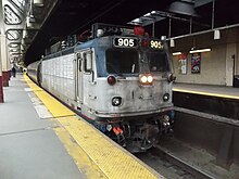 Amtrak EMD AEM-7 #905 with a westbound Pennsylvanian at Newark in 2012. This engine will be swapped out for a diesel locomotive in Philadelphia.