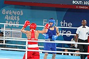 Deutsch: Boxen bei den Olympischen Jugendspielen 2018 Tag 12, 18. Oktober 2018 - Finale im Leichten Weltergewicht Jungen – Ilia Popov (Russland, rot) schlägt Talgat Shaiken (Kasachstan, blau) 4-1; Ringrichter ist James Beckles (Trinidad und Tobago). English: Boxing at the 2018 Summer Youth Olympics on 18 October 2018 – Final Light Welterweight Boys Bout - Ilia Popov (Rusia, rojo) supera a Talgat Shaiken (Kazajstán, azul) 4-1; Referee is James Beckles (Trinidad and Tobago). Español: Boxeo en los Juegos Olímpicos Juveniles de Verano de 2018 en 18 de octubre de 2018 - Chicos de peso welter ligero final: Ilia Popov (Uzbekistán, roja) le gana a Talgat Shaiken (Egipto, azul) 4-1; El árbitro es James Beckles (Trinidad y Tobago).