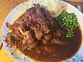 Braised oxtail done in the slow cooker, with mashed potato, peas and gravy (34471092391).jpg