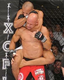 Magno Almeida, top, chokes out Mike Campbell in CES MMA's inaugural event in 2010. CampbellAlmeida.jpg