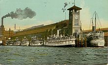 Colman Dock with mosquito fleet ships in 1912 Colman Dock, Seattle WA, circa 1912.jpg