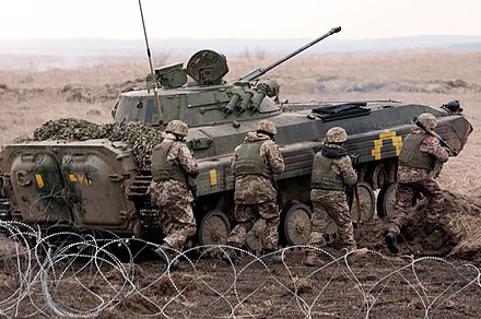 Armed Forces of Ukraine soldiers conducting combined arms tactics training with a BMP-2 IFV
