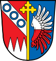 Gemeinde Großeibstadt Durch einen goldenen Kreuzstab gespalten von Rot und Blau; vorne über drei gesenkten silbernen Spitzen ein silberner Schrägbalken, belegt mit drei blauen Ringen, hinten ein von Silber und Rot geteilter Flug.