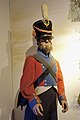 Danish-Norwegian foot artillery uniform ca 1810. Shako, plume, crossbelt, cartridge pouch, tunic coat. Mannequin. Forsvarsmuseet Oslo 2020-02-24 2749.jpg