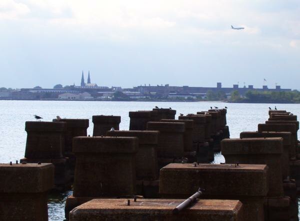 The CRRNJ Newark Bay Bridge, demolished in the 1980s, crossed to Elizabethport, seen in the distance.