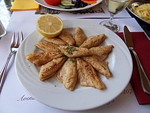 Indigenous fishes, such as perch, are often served in lakeshore restaurants Filets de perches du Leman - 1.JPG