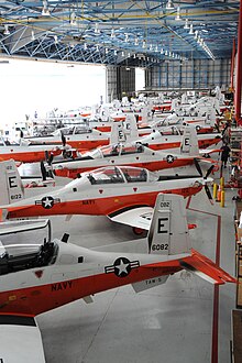T-6Bs from TW-5 in hangar at NAS Whiting Field in 2012. Flickr - Official U.S. Navy Imagery - T-6B Texan II aircraft fill the North Field hangar at Naval Air Station Whiting Field..jpg