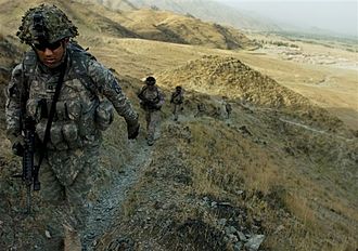 10th Mountain Division troops from the 1st Battalion, 32nd Infantry hike through Kunar Province. Flickr - The U.S. Army - Security patrol.jpg