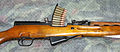 SKS rifle with a 10-round stripper clip of 7.62×39mm ammunition