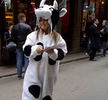 Woman in cow costume promoting Free Cone Day outside a Ben & Jerry's shop in Stockholm, Sweden Freeconeday cowgirl.jpg