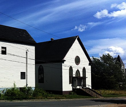 The former Congregation Sons of Israel synagogue, in Glace Bay. In 1902, the synagogue was Nova Scotia's first purpose-built synagogue. It permanently closed in July 2010. To the left is the also closed Talmud Torah community centre. This was the location of the Hebrew school and functions like Bar Mitzvah and wedding dinners.