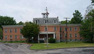 Greene County Office Building, Cairo, New York, formerly the Greene County Alms House. Built 1883. John B. Halcott (1846-1895), architect. Mull & Fromer, contractors. Greene County Office Building - Cairo, NY - 2008-06-06.JPG